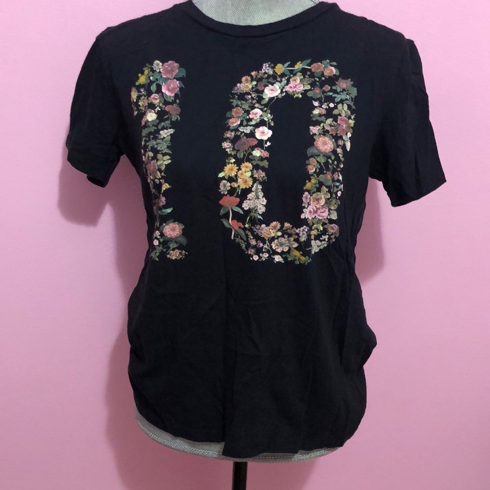 Black top with floral number 10 logo